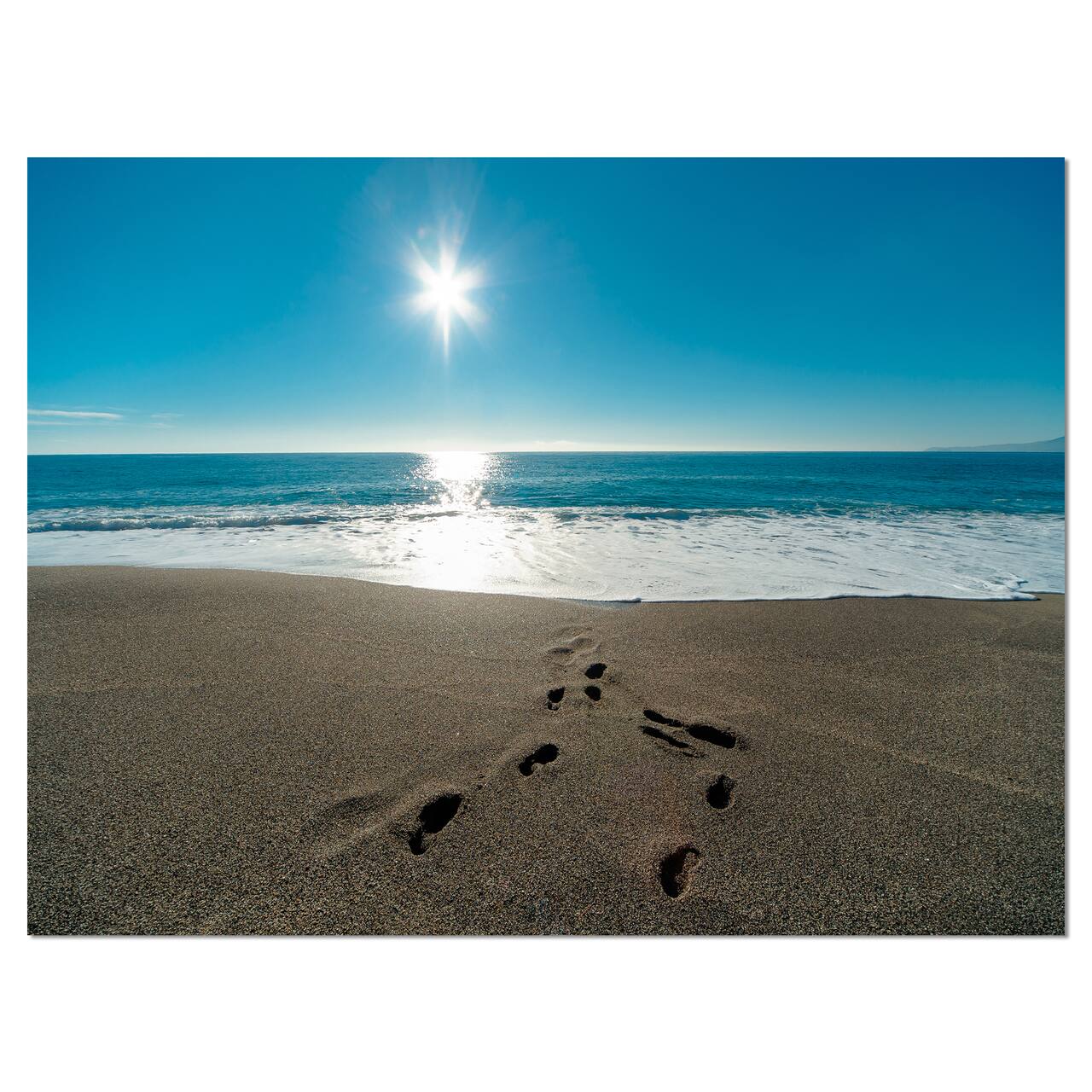 Designart - Blue Sea and Footprints in Sand - Large Seascape Art Canvas Print